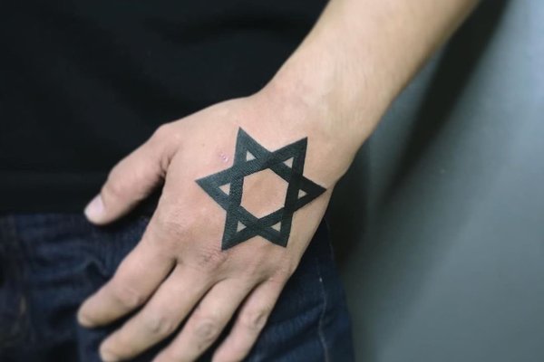 1652258222_8-o-tendencii-com-p-tatu-zvezda-v-kruge-foto-8