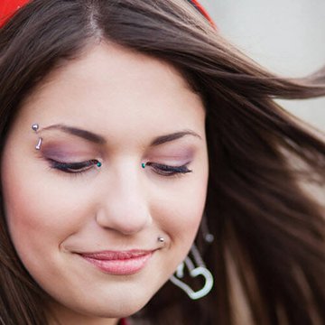 Girl-With-Eyebrow-Piercing-And-Madonna-Piercing.jpg